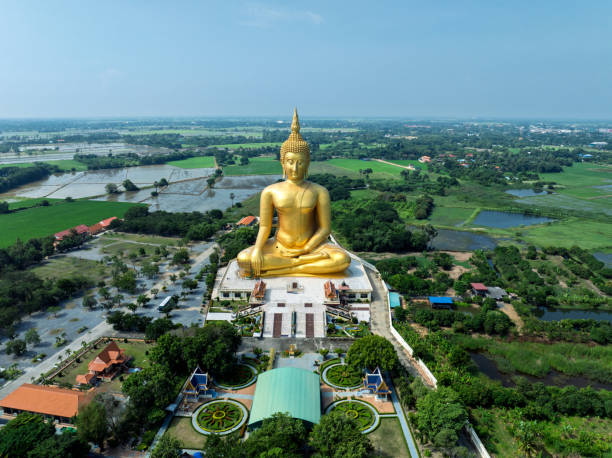Big golden buddha statue at Wat Muang temple in Ang Thong Province, Thailand